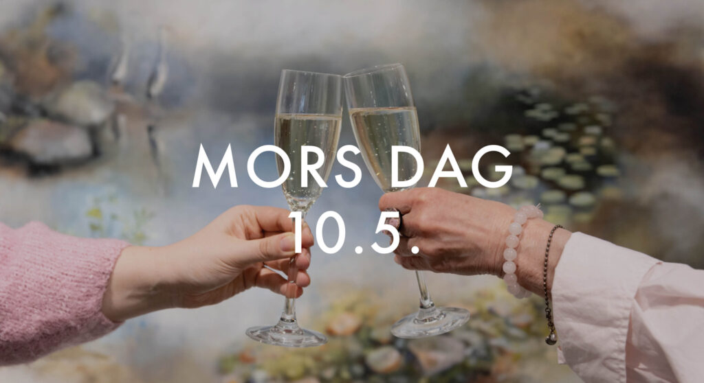 Två personer skålar med champagneglas.